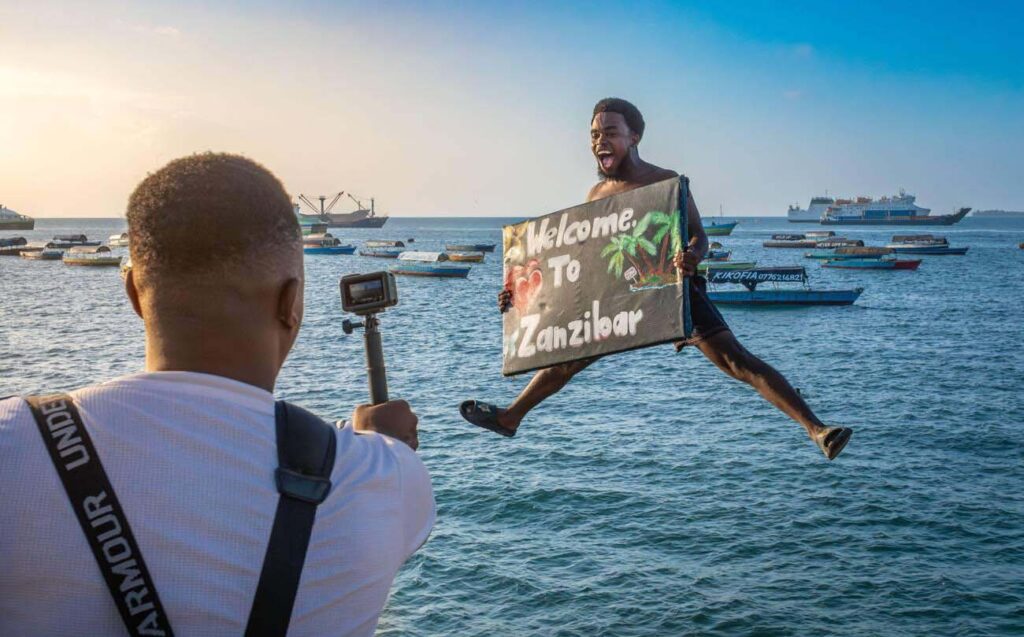 How to Get to Zanzibar: Complete Transportation Guide 9 Jumping off Stone Town