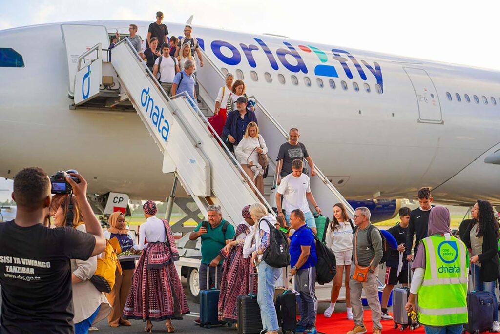 How to Get to Zanzibar: Complete Transportation Guide 3 Tourists arriving in Zanzibar 1