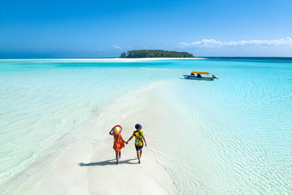 Zanzibar Travel Costs: Complete Budget Breakdown 2025 5 Walking on a Sandbank Zanzibar